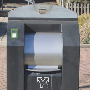 A waste bin equipped with access control system on the the street