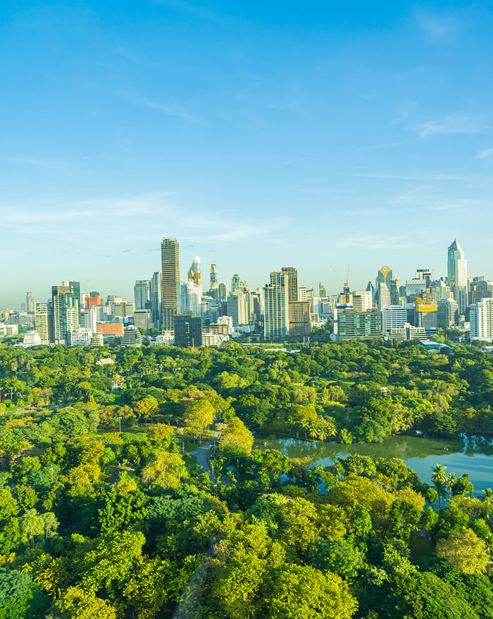 Bird's-eye view of a green smart city skyline.