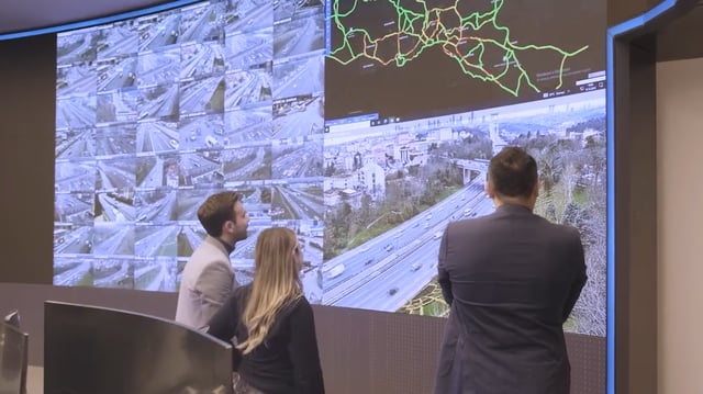 people watching traffic on screen