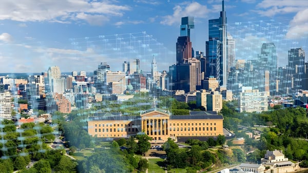 Philadelphia skyline and Museum of Art with a digital blockchain grid overlay.