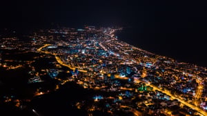 aerial view city at night smart streelighting