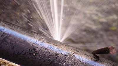An image of a pipe leaking water creating a continuous flow