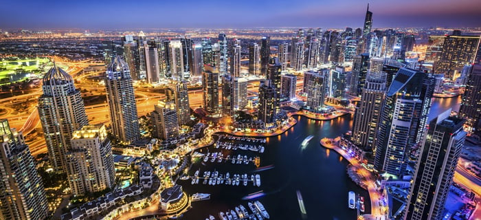 City of Dubai at night with an ongoing smart street lighting project.