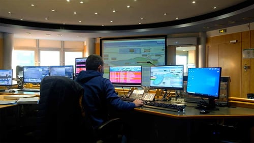Photo of an operator working in Eau de Marseille smart utility supervision center.