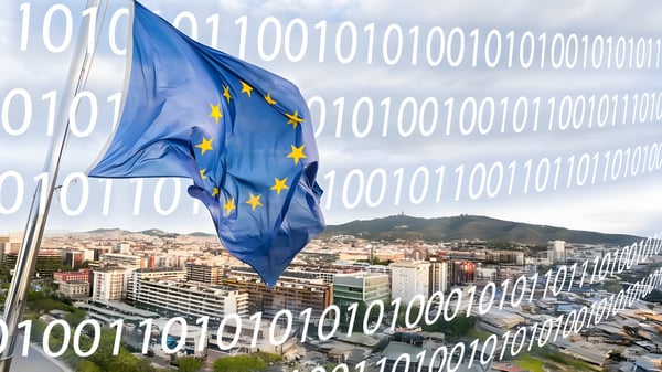 European Union flag waving over a city skyline with a digital binary code overlay.