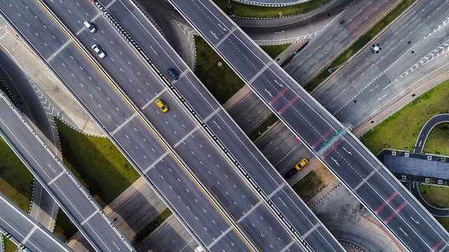 An areal view of a highway equipped with a smart road monitoring solution.