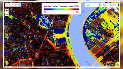 Kerimap urban thermal comfort index map showing heat island intensity across a city divided by a river.