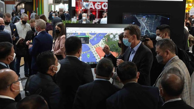 People looking at a demonstration of a Smart City Platform