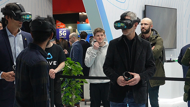 Photo of a man testing a veritual reality device at the mobile world congress in Barcelona