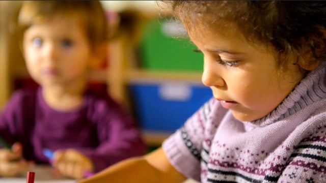 Kids in school in Paris equipped with Micro Air Quality Sensors.