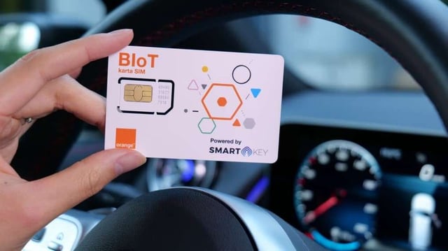 A city personel using a sim card that enable blockchain solution connectivity for smart cities.