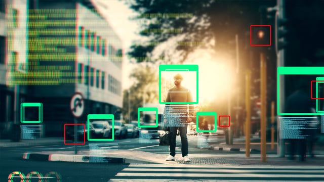 Computer vision graphics with bounding boxes and code overlay a pedestrian crossing a sunlit city