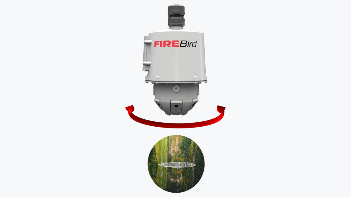 A Lindsey FireSense FireBird wildfire detection sensor with a red rotation arrow and a circular forest reflection.