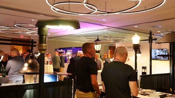 Attendees view street lighting fixtures and displays at the Streets & Area Lighting Conference (SALC) exhibition hall.