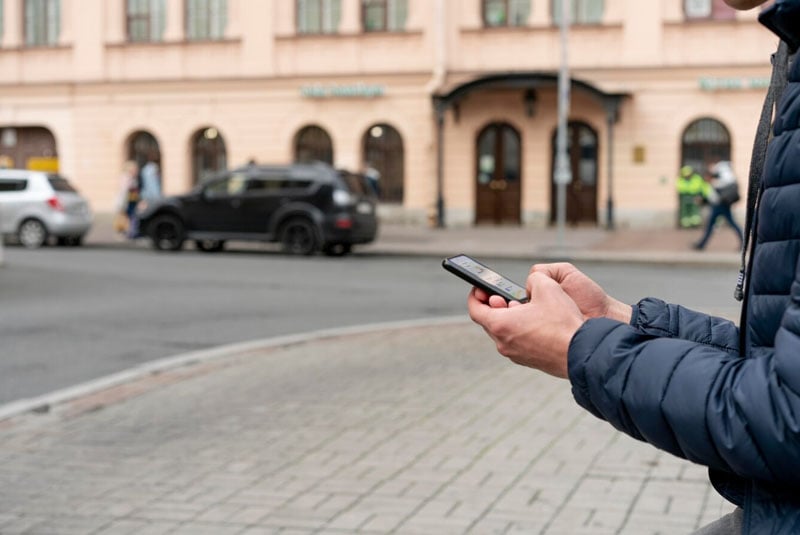 A person using a Smart Parking system