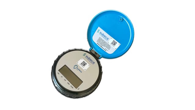 Blue smart water meter with a digital odometer register