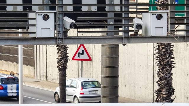 Smart Camera monitoring a traffic on a smart city road.