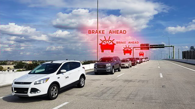 Photo with imagery representing smart mobility and V2X technology