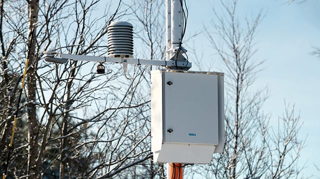 Image of vaisala smart weather and road monitoring sensor mounted on a pole in West des Moines