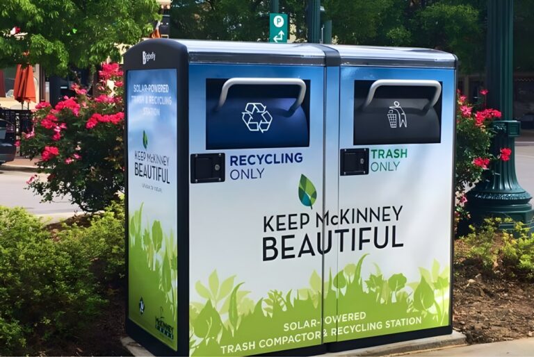 Solar-powered trash compactor and recycling station on a sidewalk in McKinney, Texas.