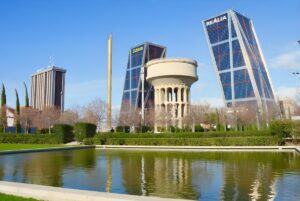 The Canal de Isabel II water tower in Plaza de Castilla, Madrid, situated between the leaning Gate of Europe towers.
