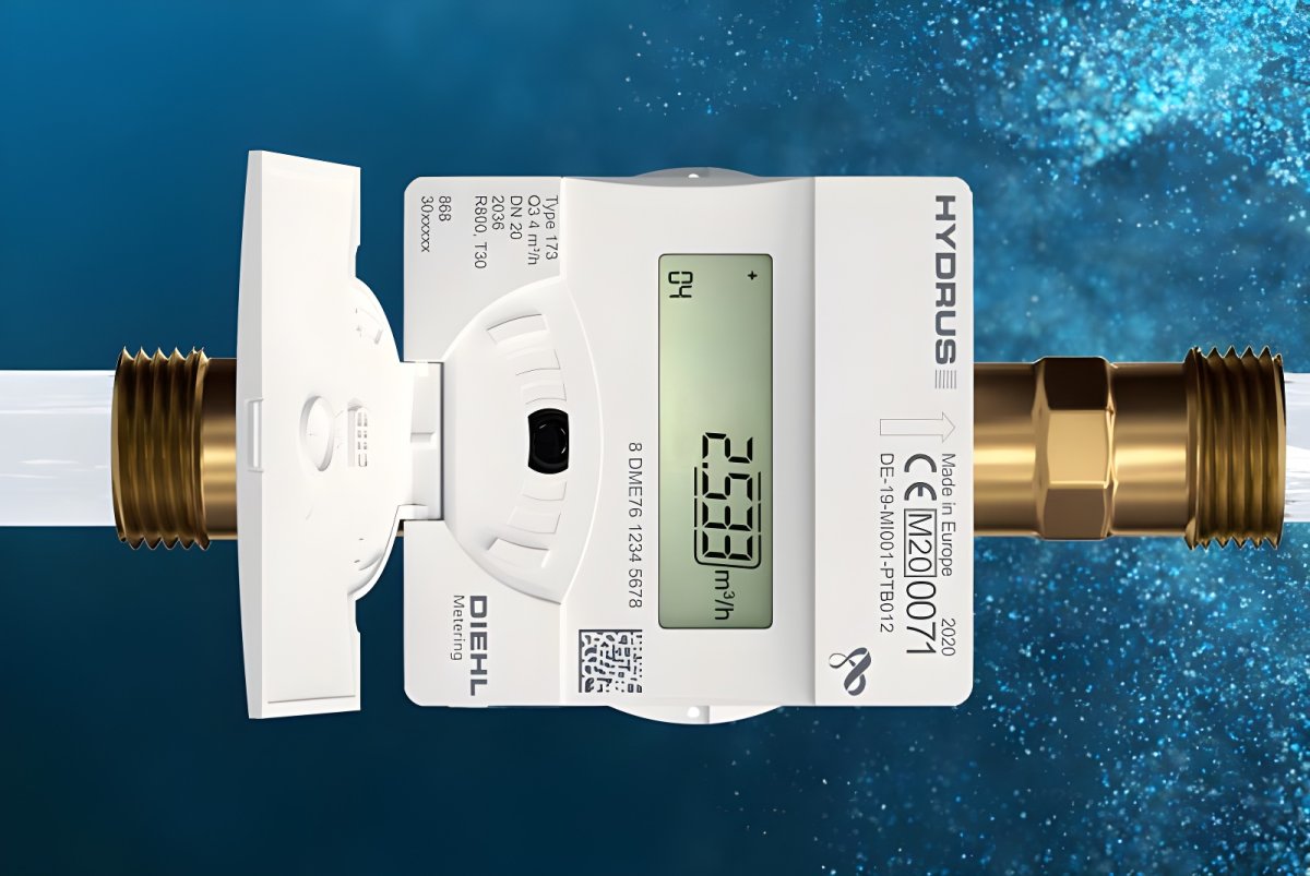 Diehl Metering Hydrus ultrasonic water meter with a digital display showing flow rate against a blue water background.