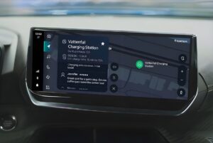 In-car infotainment screen displaying a navigation map and location details for a Vattenfall EV charging station.