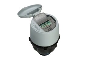 Honeywell smart water meter with an open grey lid and digital LCD display against a white background.