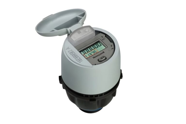 Honeywell smart water meter with an open grey lid and digital LCD display against a white background.