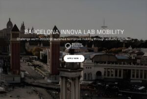 Barcelona Innova Lab Mobility text overlay on an aerial view of the Venetian Towers and Plaça d'Espanya in Barcelona.