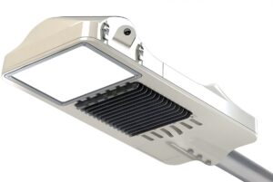 Close-up of a Juganu smart LED street light fixture with integrated sensors and a cooling heat sink.