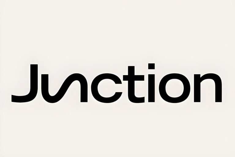 Black Junction logo with a stylized letter u on a light beige background.
