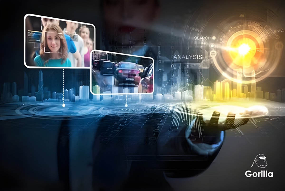Digital interface showing facial recognition and vehicle tracking over a city skyline with the Gorilla company logo.