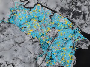 Satellite radar map of a geographic region with blue shaded areas and yellow data points indicating network locations.