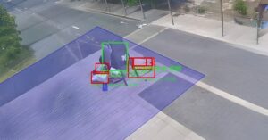 High-angle Wintics software interface showing digital bounding boxes identifying waste bags on a paved urban sidewalk.