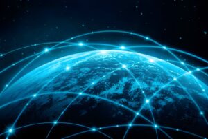 Digital illustration of Earth from space with glowing blue network lines and data points connecting across the globe.
