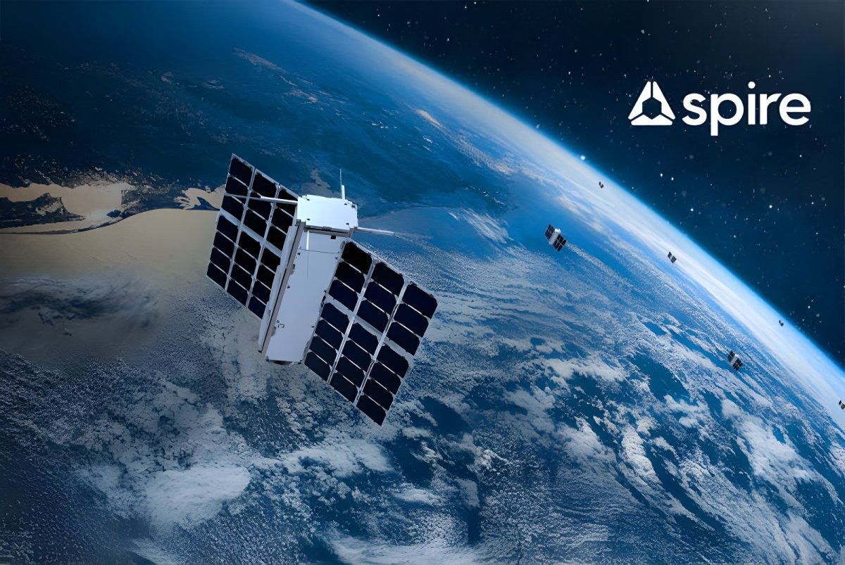 Digital rendering of Spire satellites orbiting Earth with the Spire logo in the upper right corner.
