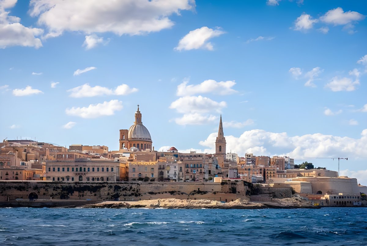 Skyline of Valletta, Malta, featuring the Basilica of Our Lady of Mount Carmel and St Paul's Pro-Cathedral from the sea.