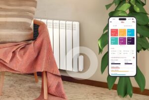 Smartphone displaying the Tiko smart heating app next to a wall-mounted electric radiator in a living room.