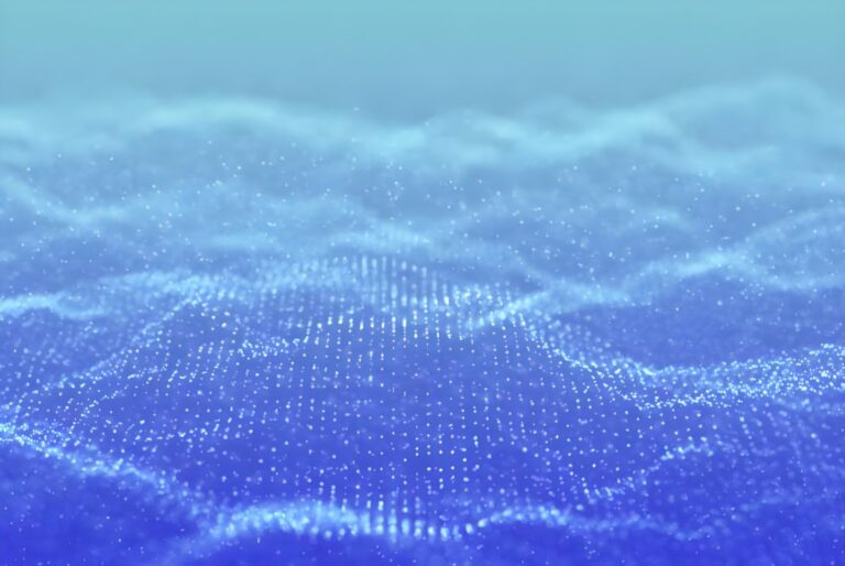 Abstract blue digital wave composed of glowing light particles and a grid pattern representing data.
