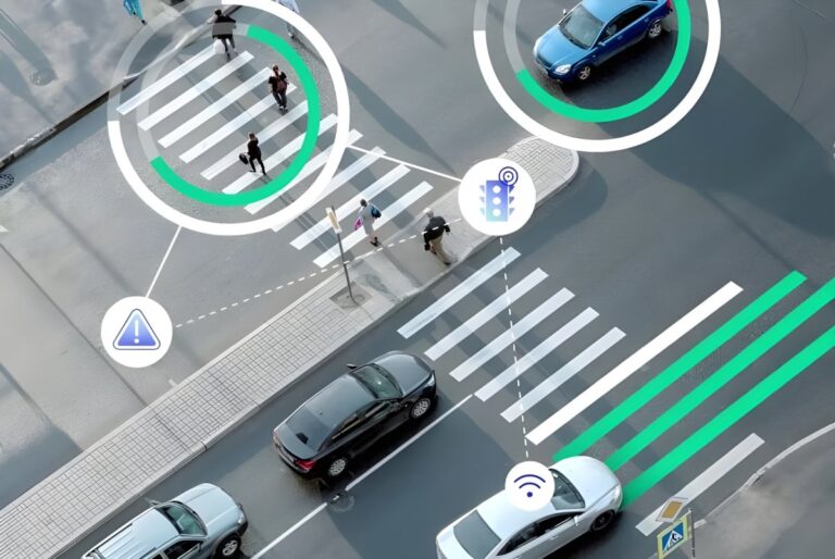 Aerial view of a city crosswalk with digital overlays tracking pedestrians and vehicles for smart traffic management.
